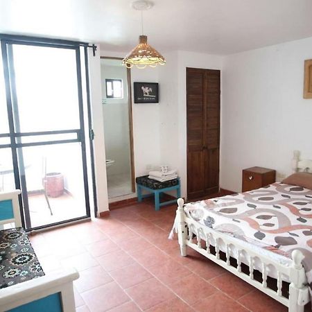 Hostal El Cascabel โชลูลา ภายนอก รูปภาพ